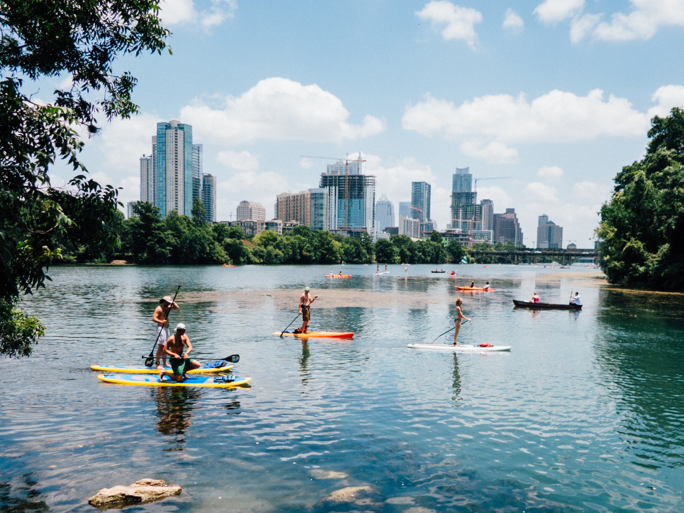 Austin residents paddle boarding